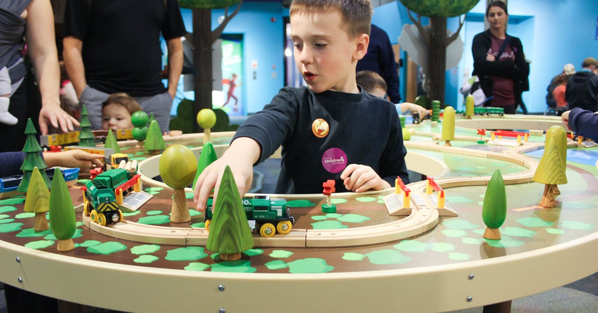 boy playing in the Forever Forest