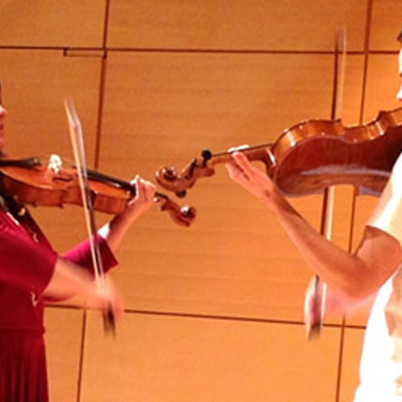 Violin Teacher with student