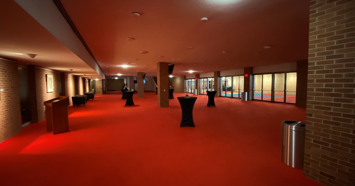 cocktail tables in the red carpet lobby